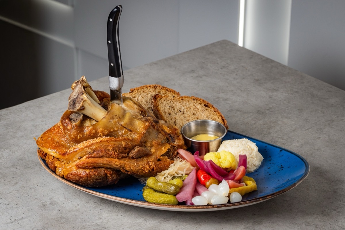 Roasted Pork Knuckle - Traditional Czech Dish at U Malvaze Prague Restaurant